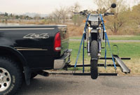 Tilt-A-Rack 2 Bike Holder With One Bike Loaded Side View